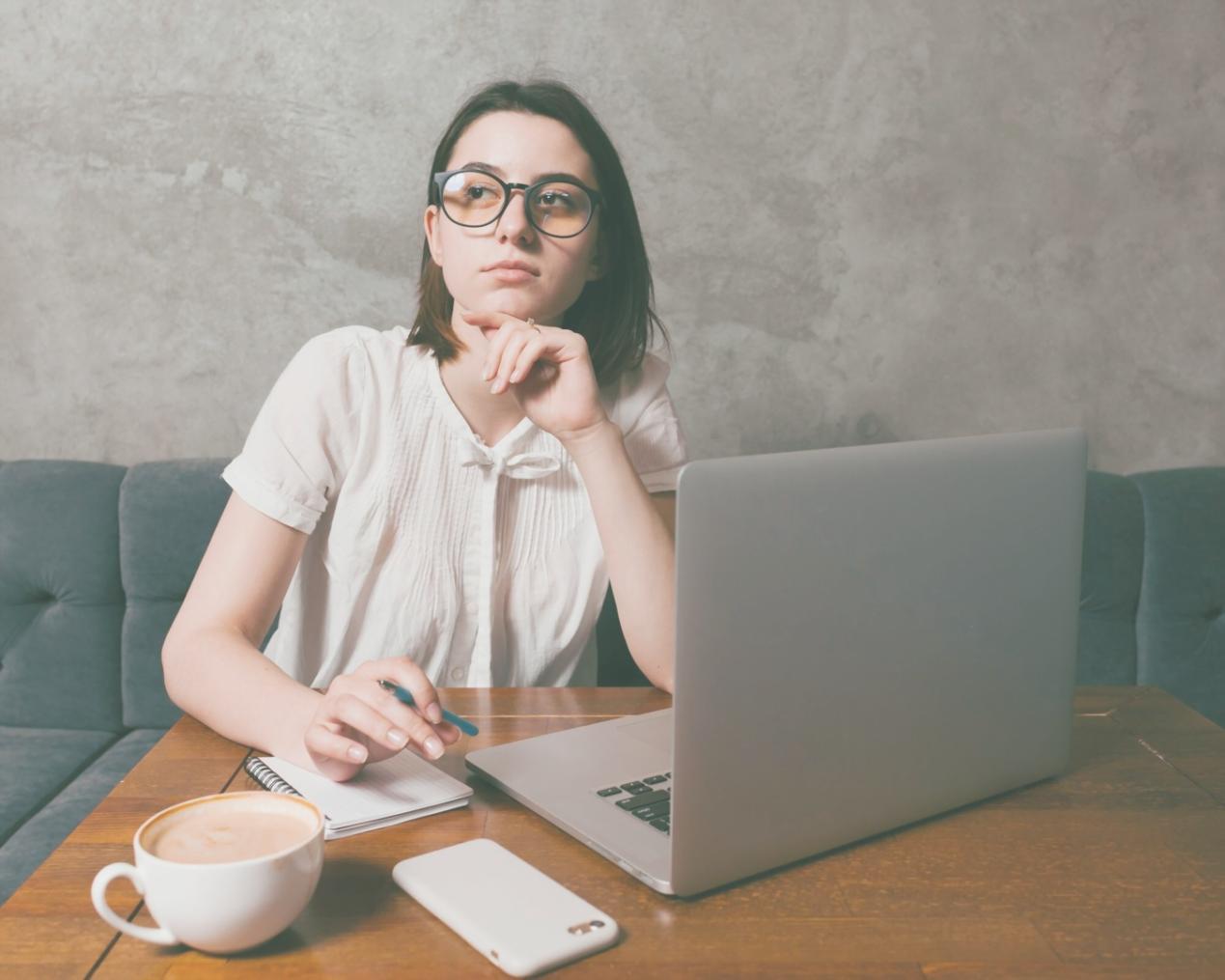Person using laptop for online budgeting and financial management